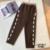 Pantaloni da donna Pantaloni da donna Fluffing Elastico in vita Tempo libero Harem Nero Beige Maglione caffè Pantaloni moda 2023