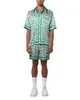 casablanca button-up overhemdstijl overhemd met groene bloemenletters loszittend veelzijdig trendy heren- en damesoverhemd met korte mouwen