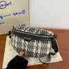 Sacs de taille Niche sac pour femme 2023 nouvelle tendance de la mode sac de taille tricoté sac de poitrine à carreaux pratique sac à bandoulière version coréenne sac à bandoulièrestylishdesignerbags