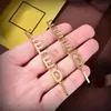 Женские дизайнерские буквы Серьги Держатся золотые заработки серебряные серьговые срезы