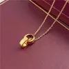 2023 nuova coppia di moda ciondolo marca doppio anello ovale pancake regalo di diamanti collana di design di alta qualità in oro per le donne