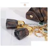 Llaveros Cadenas de cuero Joyas Flor marrón A cuadros Borla Monedero Llaveros Colgante Moda Mini Bolsa de almacenamiento Encanto Llaveros Acceso Dhbgu