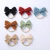 Söt stickning ull bowknot elastisk hårband spädbarn solid färg virkning bågar nylon pannband barn huvudbonads födelsedag present