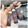 Chaveiros Lanyards Designer de Moda Chaveiro Clássico Requintado Luxo Carro Chaveiro Liga de Zinco Letra Uni Lanyard Metal Pequenas Joias Dhib8