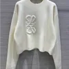 23SS新しい女性秋のトレンディな長袖のトップハイエンドスリムプルオーバーコートデザイナーセーター女性ホワイトシンニットセーター