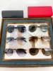 Lunettes de soleil femmes pour femmes hommes lunettes de soleil Style de mode pour hommes protège les yeux UV400 lentille avec boîte aléatoire et étui 1136 00