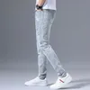 Jeans da uomo Fashion Stretch Denim Jeans Uomo Primavera Autunno Strappato Retro Drill Ricamo Slim Piedi piccoli Pantaloni lunghi versatili blu 230808