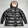 Tasarımcılar aşağı ceketler puffer ceket kadın kış kapüşonlu ceket pembe astar eğimli fermuar tasarım büyük boyutlu uzun kollu kapüşonlu ceket tasarımcı kadınlar