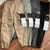 Kamienie Spodnie wyspowe spodnie towarowe bawełniane męskie spodnie wyspiarskie multi kieszeni kombinezon spodni CP designer spodnie moda marka retro jogging legginsywh4U