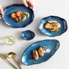 Platos Cuenco de arroz de cerámica Esmalte de horno azul Porcelana cocida a alta temperatura Tipos de dispositivos múltiples Seguro de usar Es fino y brillante