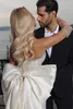 Luksusowa sukienka ślubna bez ramiączek Elegancka koronkowa suknia ślubna z muszką z musztą
