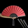 Produtos de estilo chinês liga de aço de tungstênio autodefesa kung fu ventilador dobrável ventilador de mão de metal com artesanato clássico de pano de seda com borla arte decoração presente