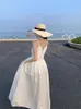 Sukienki swobodne białe rękawowe przyjęcie urodzinowe Długie kobiety francuskie lato w dekolcie prosta seksowny klub estetyczny temperament ubrania