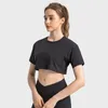 Aktiva skjortor gängade löst yogasport-t-shirt kvinnors topp korta ärm gym sexig midja show elastisk fast färg fitness outdoo