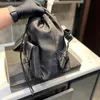 Mochila de grande capacidade Mochila de grife feminina Bolsa de tecido à prova d'água Carteira com logotipo de letra Bolsa de ombro Estilistas de moda Tramp Bags