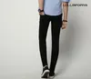 Hommes Jeans Genou Déchiré Hommes Maigre Slim Fit 2023 Mode Coréenne Troué Denim Crayon Pantalon Bleu / Noir Blanc