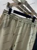 xinxinbuy män kvinnor designer pant pläd etikett fickpanelen vår sommar casual byxor brev svart khaki xs-2xl