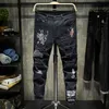 Mens Jeans Men Streetwear personalità Strappato stampato bianco skinny Hip Hop Punk Casual pantaloni jeans denim stretch moto 230809