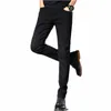 Мужские джинсы Черные мужчины Slim Fashion Business Business Buyser