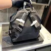 Mochila de grande capacidade Mochila de grife feminina Bolsa de tecido à prova d'água Carteira com logotipo de letra Bolsa de ombro Estilistas de moda Tramp Bags