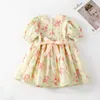 Girl's Dresses Girls Yellow Green Floral Print Smocked Dress 2023 Summer New Children Short Sleeve Princess Dress Frocks vestidos