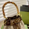 bolso de mano Diseñador de lujo Bolsos de cubo de bambú bolso de mujer monederos marrón Titular de la tarjeta con cordón Bolso de hombro de cuero genuino hombres bandolera bolsos de moda Bolso