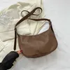 Torby na ramię japońskie i koreańskie dziewczyny osobowości 2023 Summer New Western Fashion Crossbody Bag Prosta i swobodne podtlenki torbstylishdesignerbags