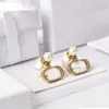 Oorrel terug luxe designer oorbellen voor vrouwen maken van roestvrij staal vergulde rosé goud oorbel brief ingelegde diamant of parel dames oorbel mode sieraden