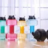 Vattenflaskor hantel fitnessflaska 0,5 och 1,5L kapacitet Creative Cup Gym Portable Outdoor Sports