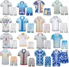Herrspårsdräkter Designer Skjorta Set Summer Short Sleeved Printed Beach Shorts Cardigan Suits