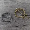 Szpilki broszki qihe biżuteria pokręcona wiking zapięcie broszka penanular płaszcz płaszcza pin metalowy szalik pin Pire Mężczyźni kobiety Wiking Biżuteria Viking Prezenty HKD230807