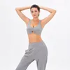 Aktiva uppsättningar Yoga Set Woman Gym Women Fitness Sportwear Sports Workout Clothes for Bra Pants stockfast med PAD