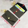 Keychains & Lanyards Designer Brand Keychain Purse Pendant Car Chain Charm Brown Flower Luxury Mini Bag Trinket Gifts Accessories 9WKU