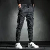 Pantaloni maschili uomini uomini mimetizzati elasticità pantaloni cargo militari che colano a più tasche pantaloni da jogger casual 230811