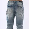 Jeans masculin 2023 Arrivée Design Fashion Men Street Blue Blue Denim Pantalon Ink Throwing Imprimé petite poussée