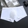 Underbyxor Youth Ice Silk U konvex Pouch Boxer Shorts Mäns elastiska underkläder Ultratunna trosor Pojkens sexiga transparenta Gasy Sports