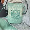 Borsa intrecciata di cannuccia francese 2023 Nuova borsa Luo Jia Welen Borsa da donna Borsa Acqua Borsa a traversa Scava Small Borsa estate