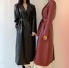 تصميم جديد للأزياء الكورية للسيدات تراجع عن طوق Midi مع حزام حزام Pu Leather Trench Coat Abrigos