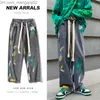 Men's Pants Graffiti jeans men's spring trend brand large elastic waist pants hip-hop wide leg pants on high streets straight and loose fitting Z230814