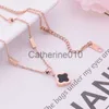 Collares colgantes Cadena de huesos de acero de titanio de oro rosa de moda japonesa y coreana con collar de trébol doblado con múltiples conexiones de acero de titanio n