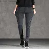 Mäns jeans 2023 Vår/sommar Ny modeband Bomullsfötter Herrens Casual Slim Fit Bekväma elastiska jeans Z230814