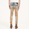 Męskie dżinsy Am marka Man Pants Streetwear Skórzana pomarańczowa gwiazda plaster dżins moda szczupła fit Ripped Men Spodni harajuku