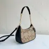 Topquality underarmsäckar kvinnors män designers totes crossbody lyxdesigner mode handväskor utskrift axelpåsar koppling totes hobo purses plånbok grossist