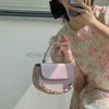 Çapraz Vücut 2023 Yaz Kalabalık Tasarımı için Yeni Flip Saddle Çantası Dokulu ve Şık Zincir Crossbody Small Square WomenstylishDesignerbags