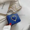 ショルダーバッグBaobao Women's New Love Mini Bag 2023ファッショナブルでファッショナブルなワンショルダークロスボディチェンジポートレッドエンベロープパールハンドバッグスタイランドバッグストア