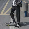 Pantaloni da uomo Nuovo skateboard sciolto Scattatura dritta jeans maschile edizione coreana marchio di moda suzzerain originale wid z230814