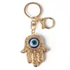 Klaki Bling Eye Eye Hamsa Ręka Blak Klapeta Bag worka Klucz Pierścienie Mężczyzn Crikon Akcesoria samochodowe Metalowe klamry