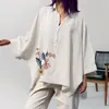 女性用ブラウス女性トップサイズのソリッドカラーターンダウンカラーソフト不規則な裾のシャツボタンバットウィングスリーブ夏のブラウス