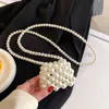 Axelväskor 2023 Summer Pearl Bag Women's Net Red Small Bag Crossbody Bag Versatile Mini Handwoven Ins Pearl Bagstylishhandbagsstore