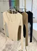 Kvinnors tröjor Fake Two-Piece Suspender Beige T-shirt för kvinnors höst 2023 Ny Slim Fiting Bottom Shirt C-059 Z230811